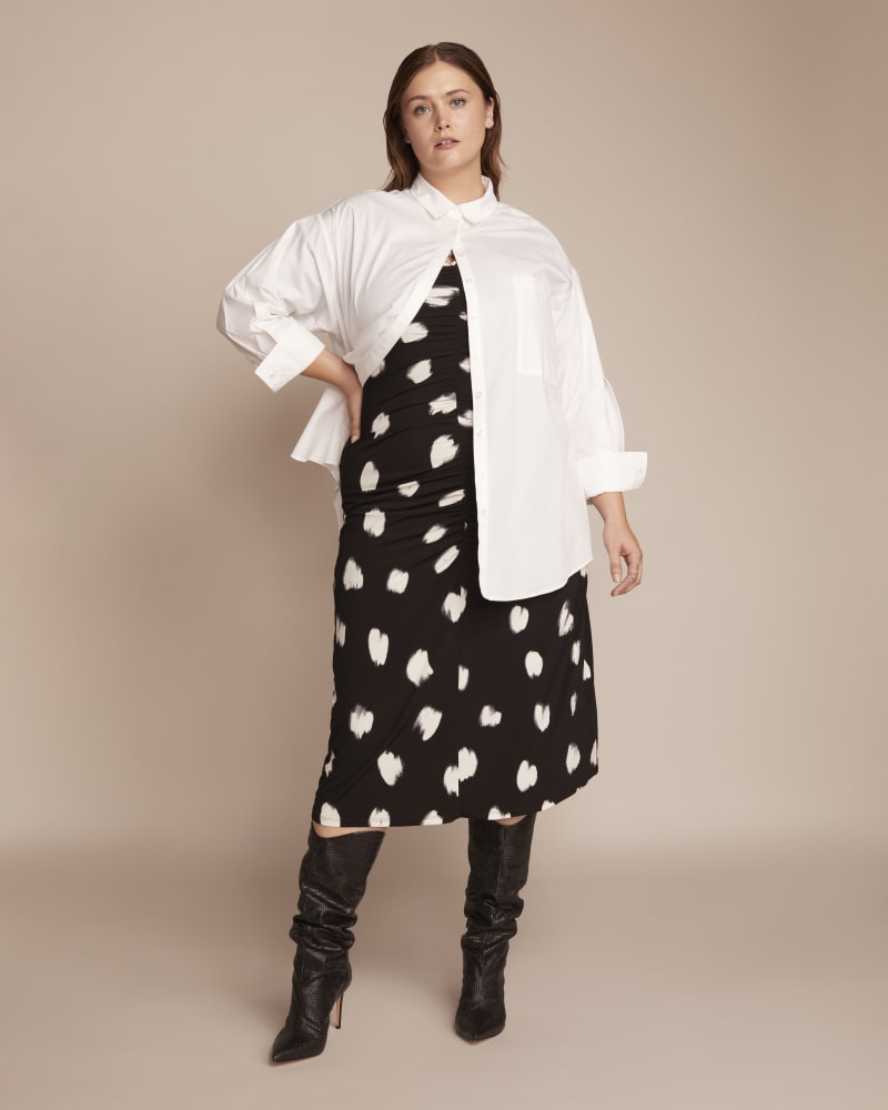 Front of a model wearing a size 1X Maeve Oversized Button-Up Shirt in White by 11 Honoré Collection. | dia_product_style_image_id:347028